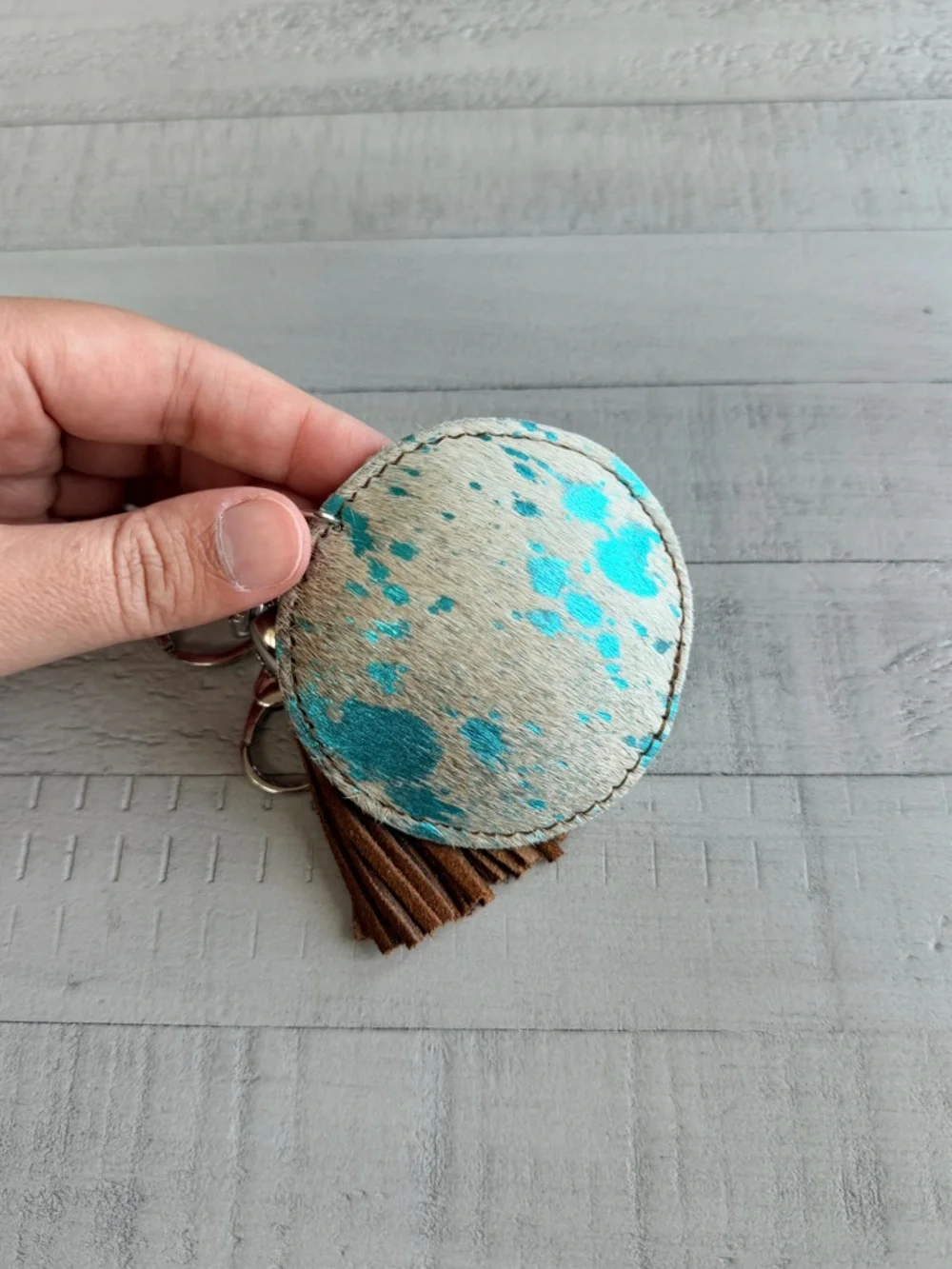 Western Acid Wash Round Turquoise & White Haircalf Keychain with Brown Tassel